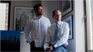 Spitzer poses for a portrait with Eran Chen of ODA
